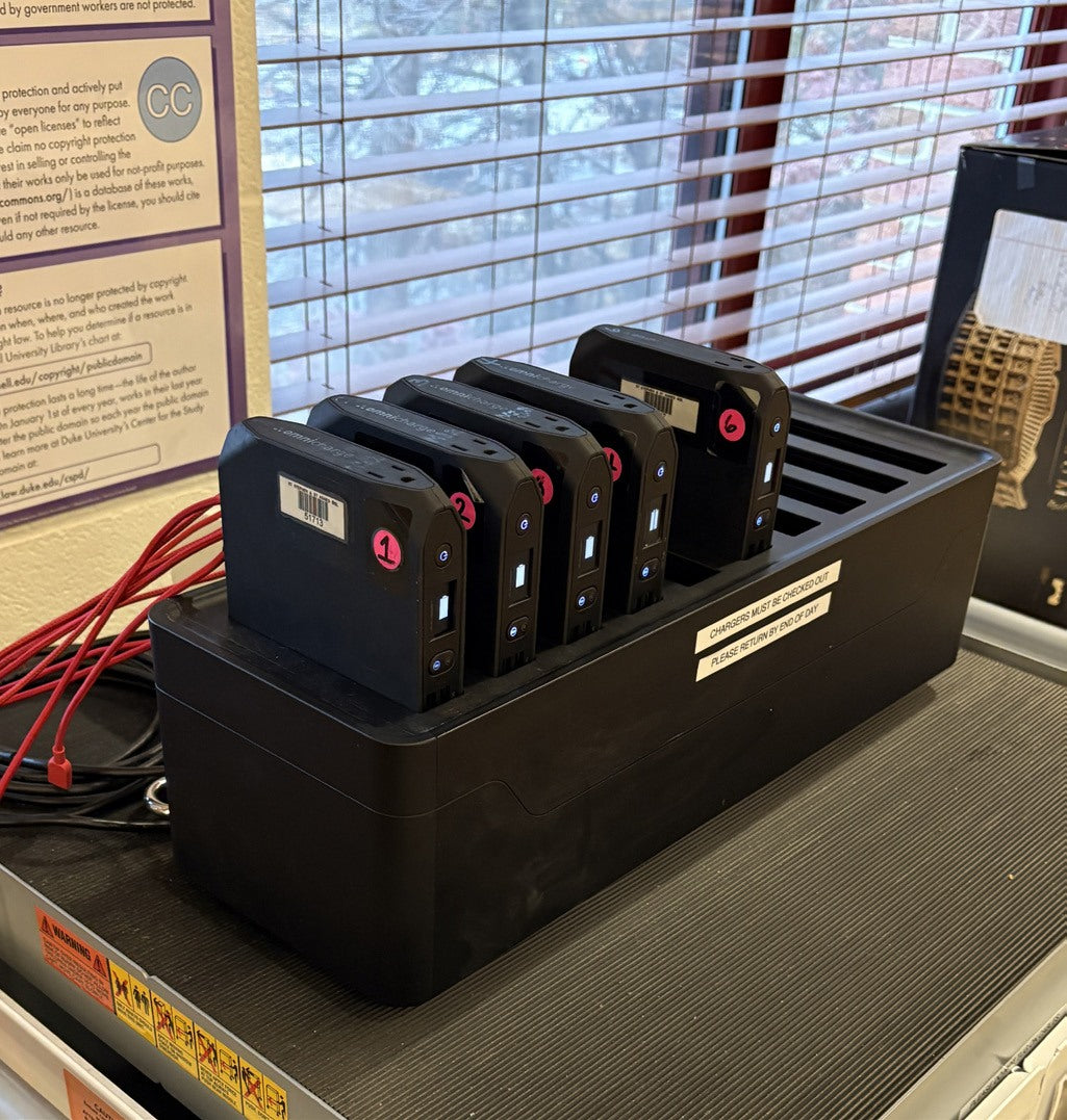 Omnicharge Power Station with labelled power banks in the library