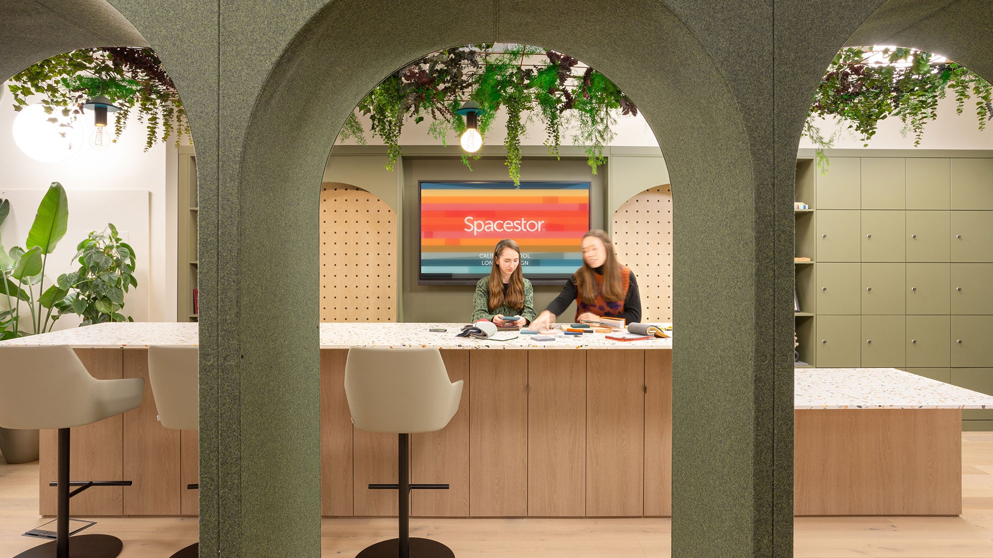 Showroom interior with demountable arches and a work counter